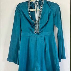 Teal BEBE JUMPSUIT size 4